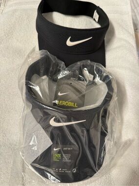 2 Nike Visors - 1 new w tags 1 new without tags - black